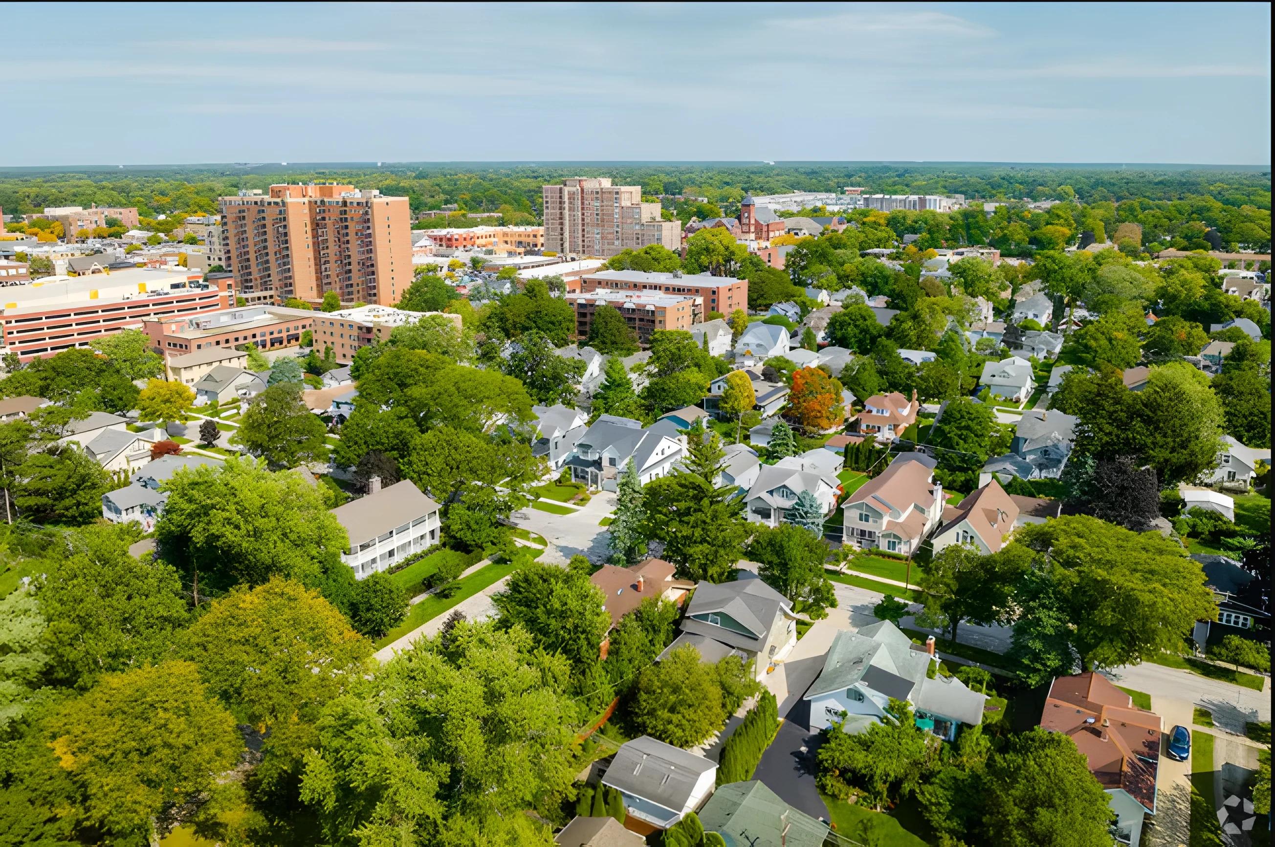Aerial view of urban neighborhood with trees and buildings